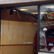 Image for article titled EXCLUSIVE: Van Dives Into Front Window Of Detroit Subway Shop